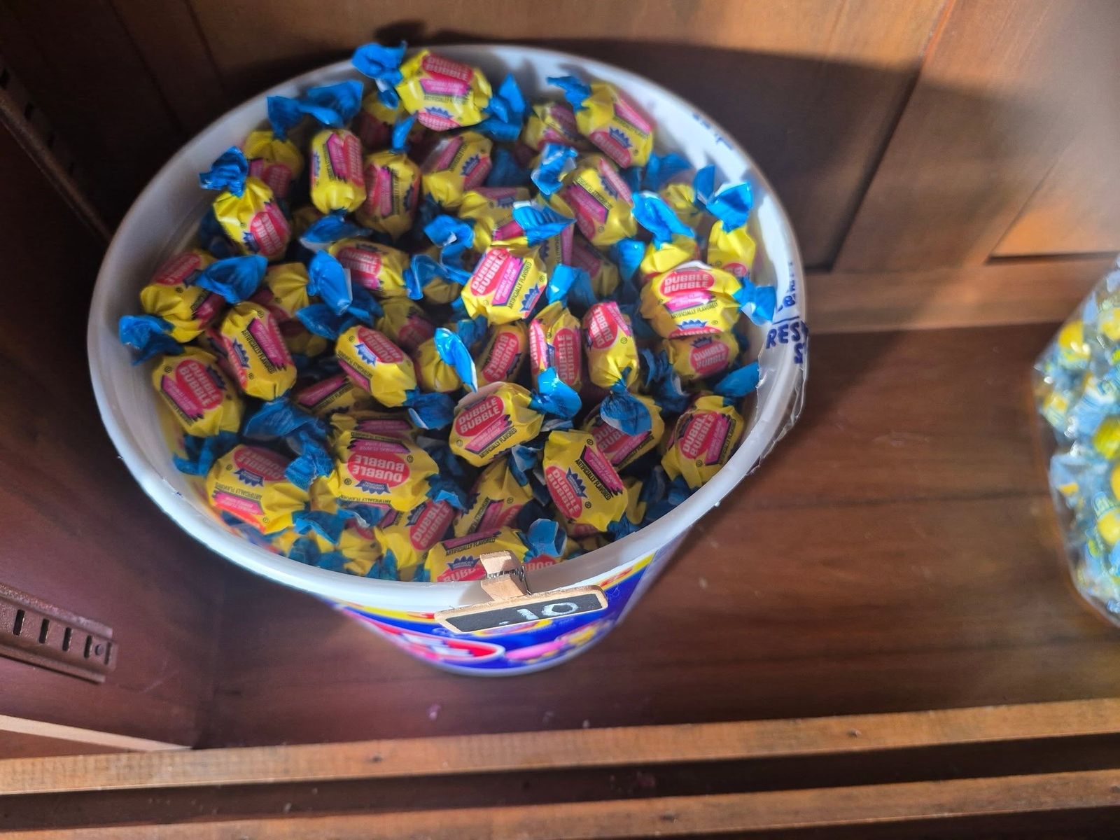 Bucket of wrapped taffy at The Candy Shoppe on Main