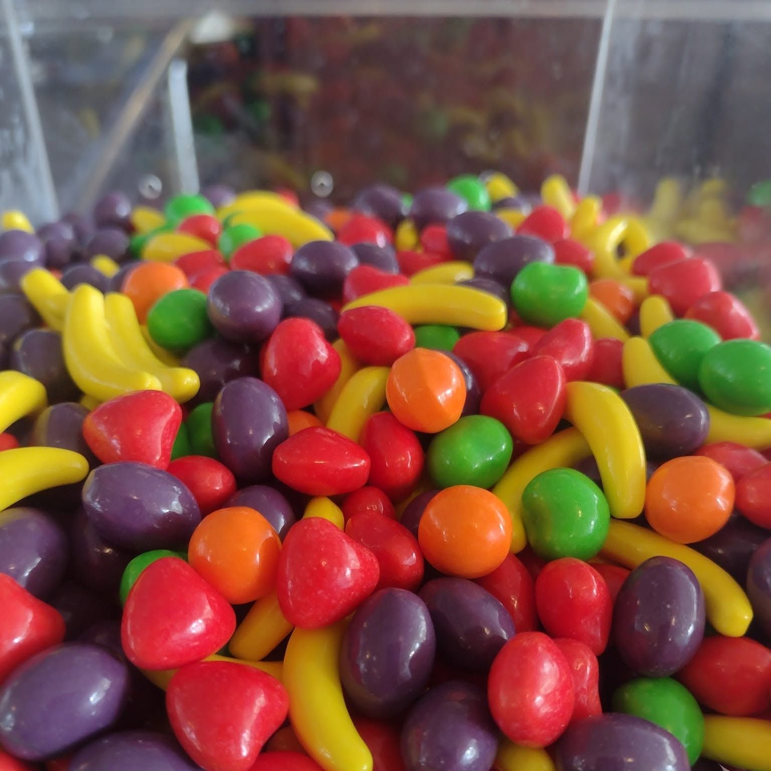 Colorful fruit candies piled high at The Candy Shoppe on Main
