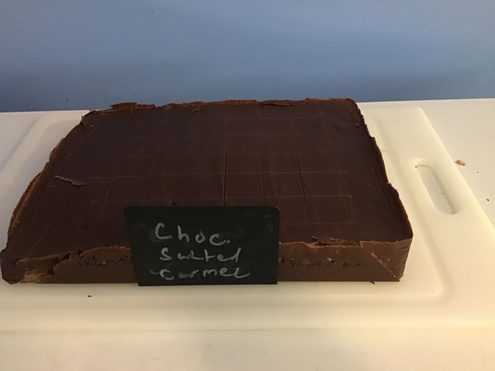 Chocolate salted caramel fudge slab in the case at The Candy Shoppe on Main