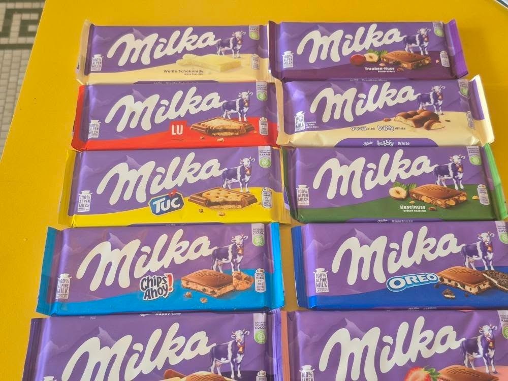 Milka chocolate bars stacked at The Candy Shoppe on Main