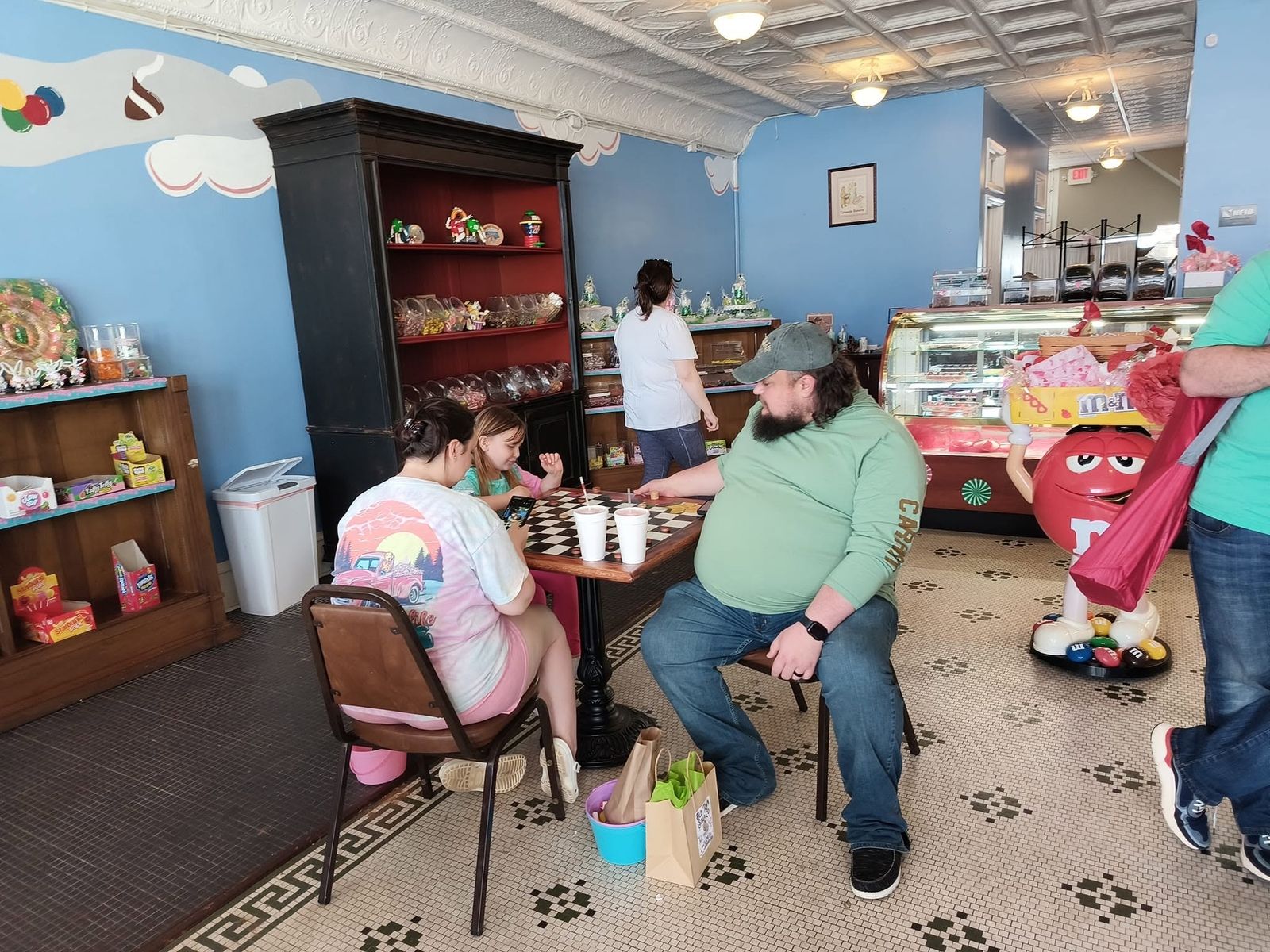 Customers seated at the dine-in tables inside The Candy Shoppe on Main
