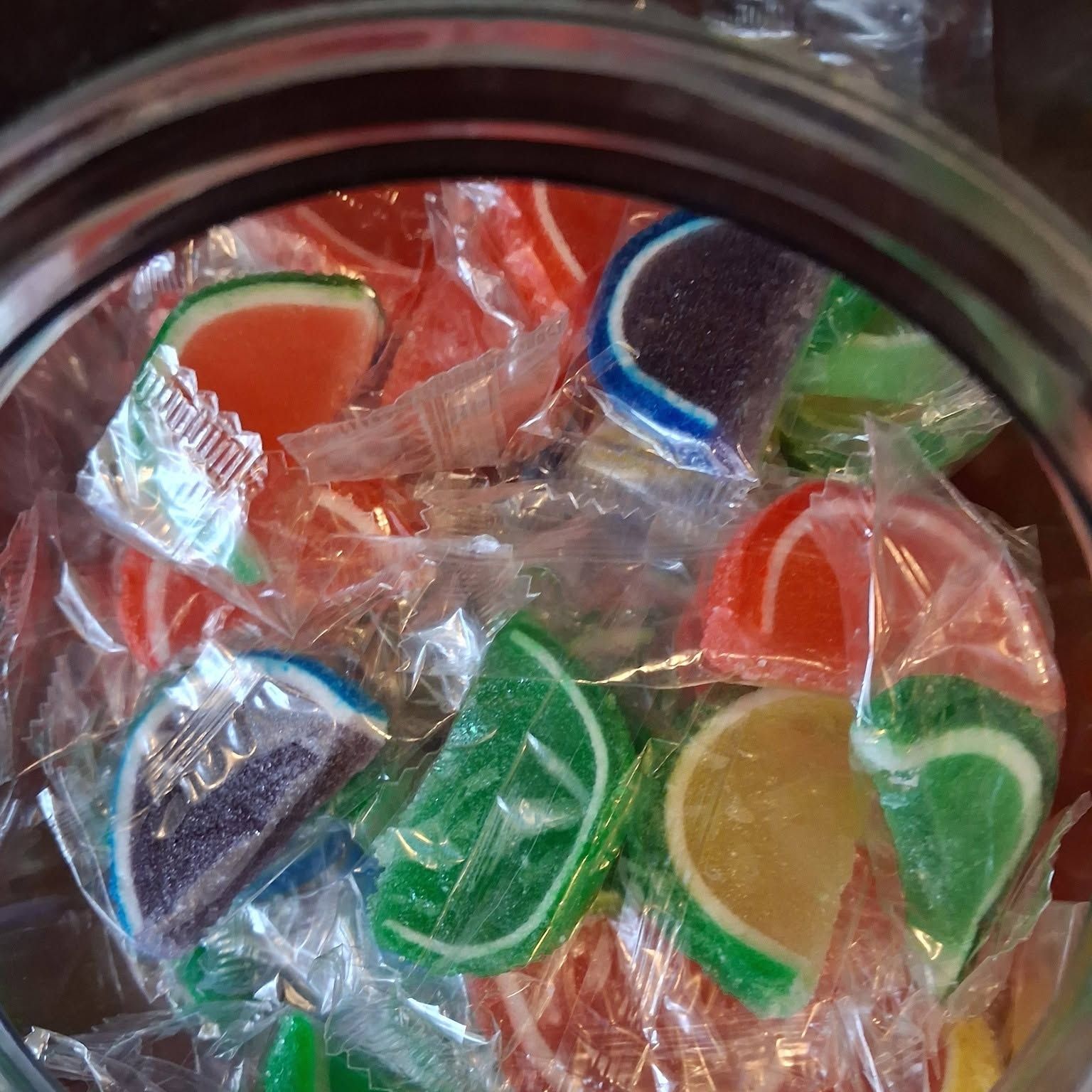 Bucket of wrapped fruit slices at The Candy Shoppe on Main
