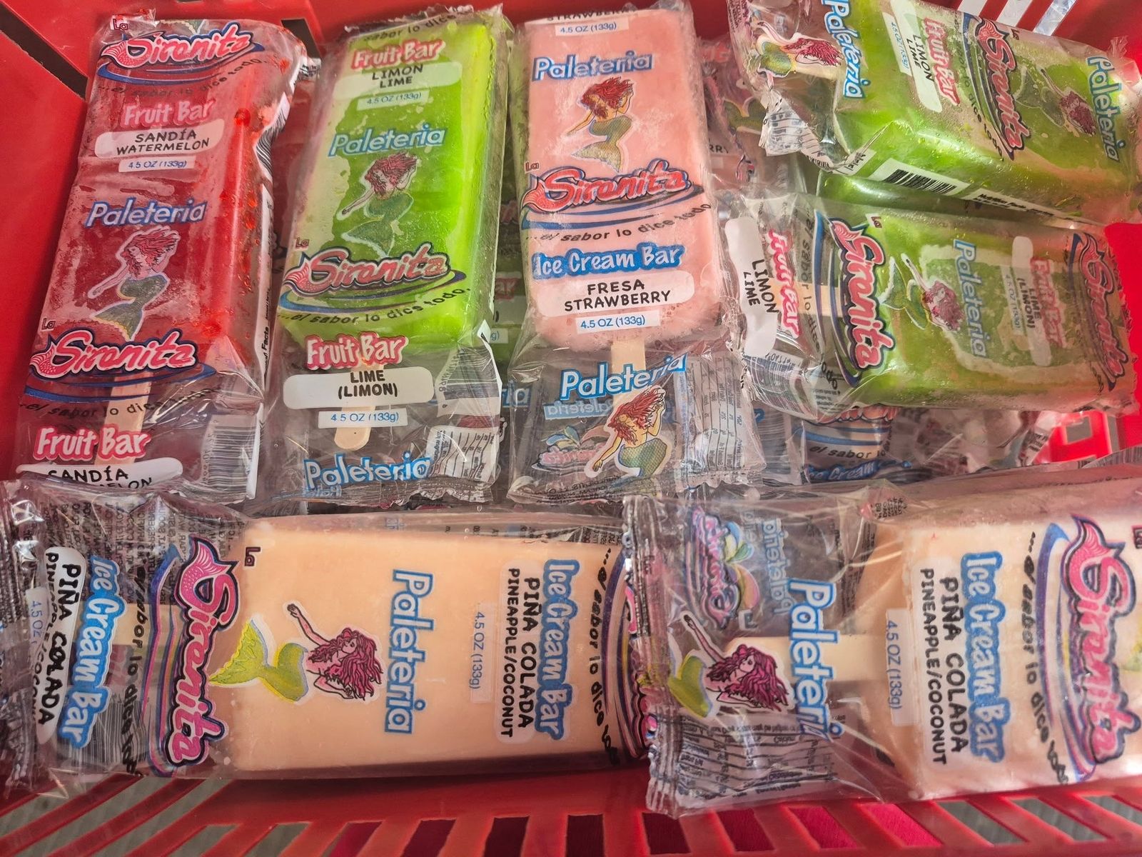 Rack of packaged candy filling the wall at The Candy Shoppe on Main
