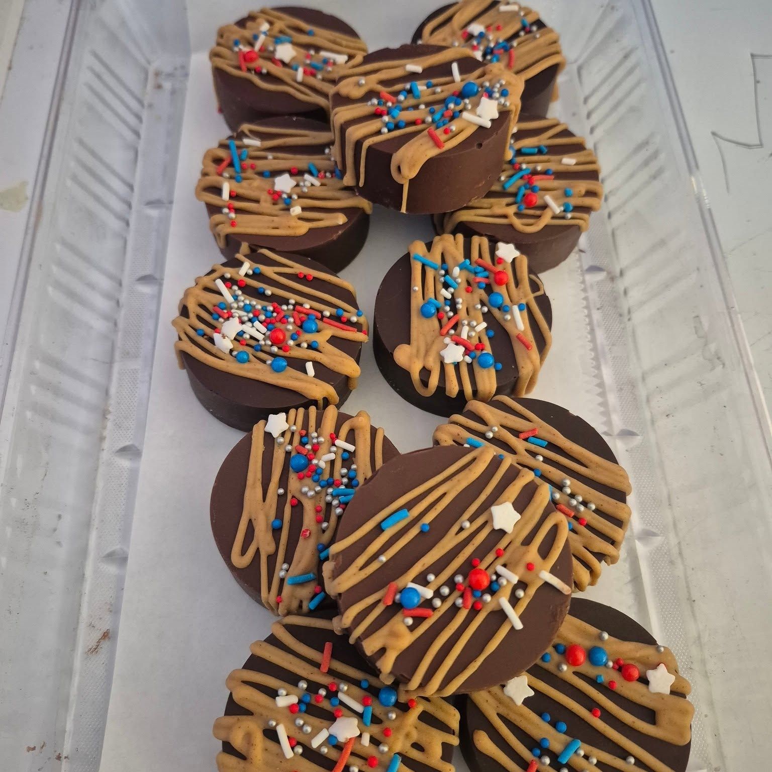 Decorated chocolate-covered sandwich cookies at The Candy Shoppe on Main