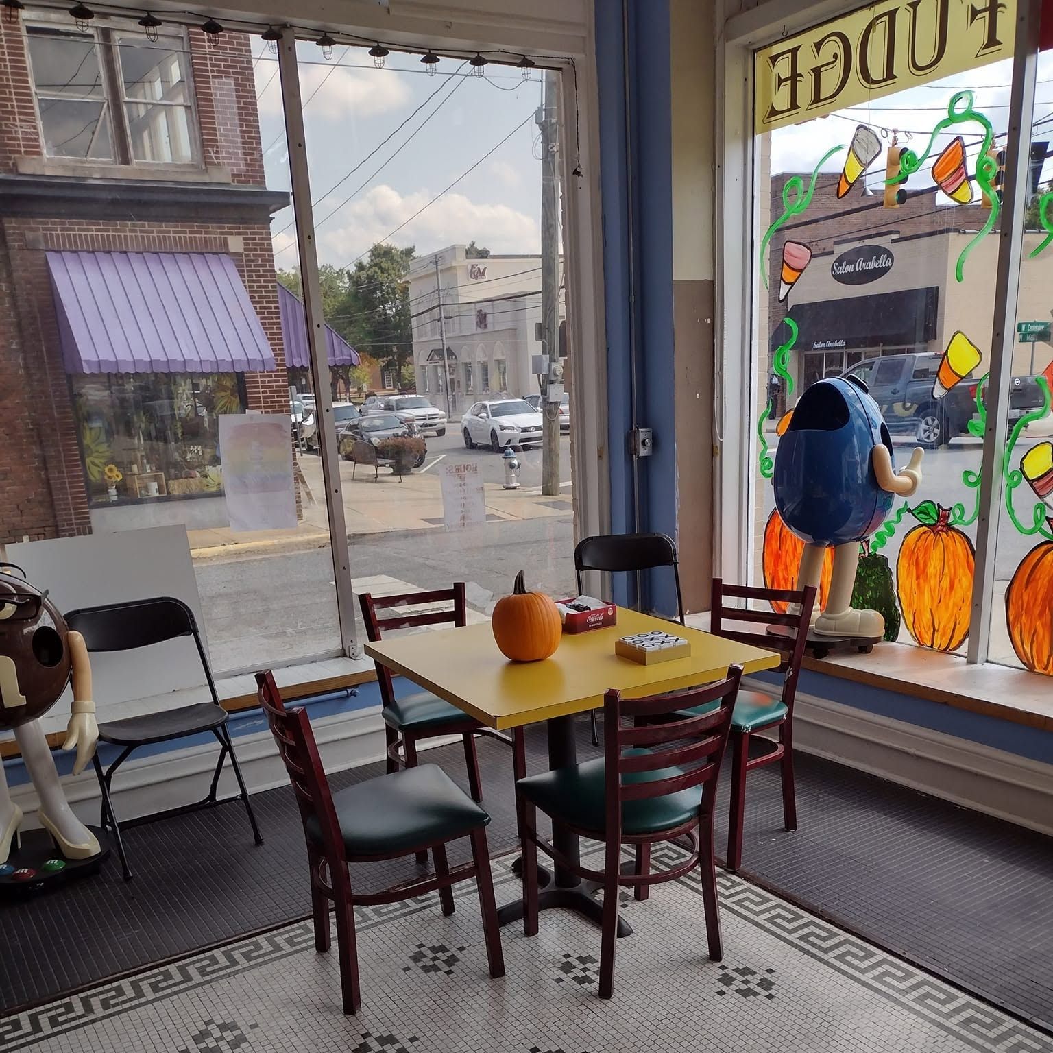 Window seating with a view of Main Street at The Candy Shoppe on Main
