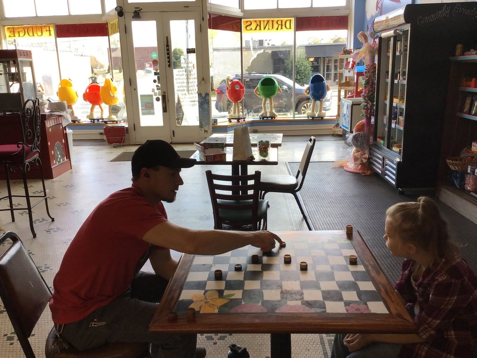 A game of checkers beside the front windows at The Candy Shoppe on Main