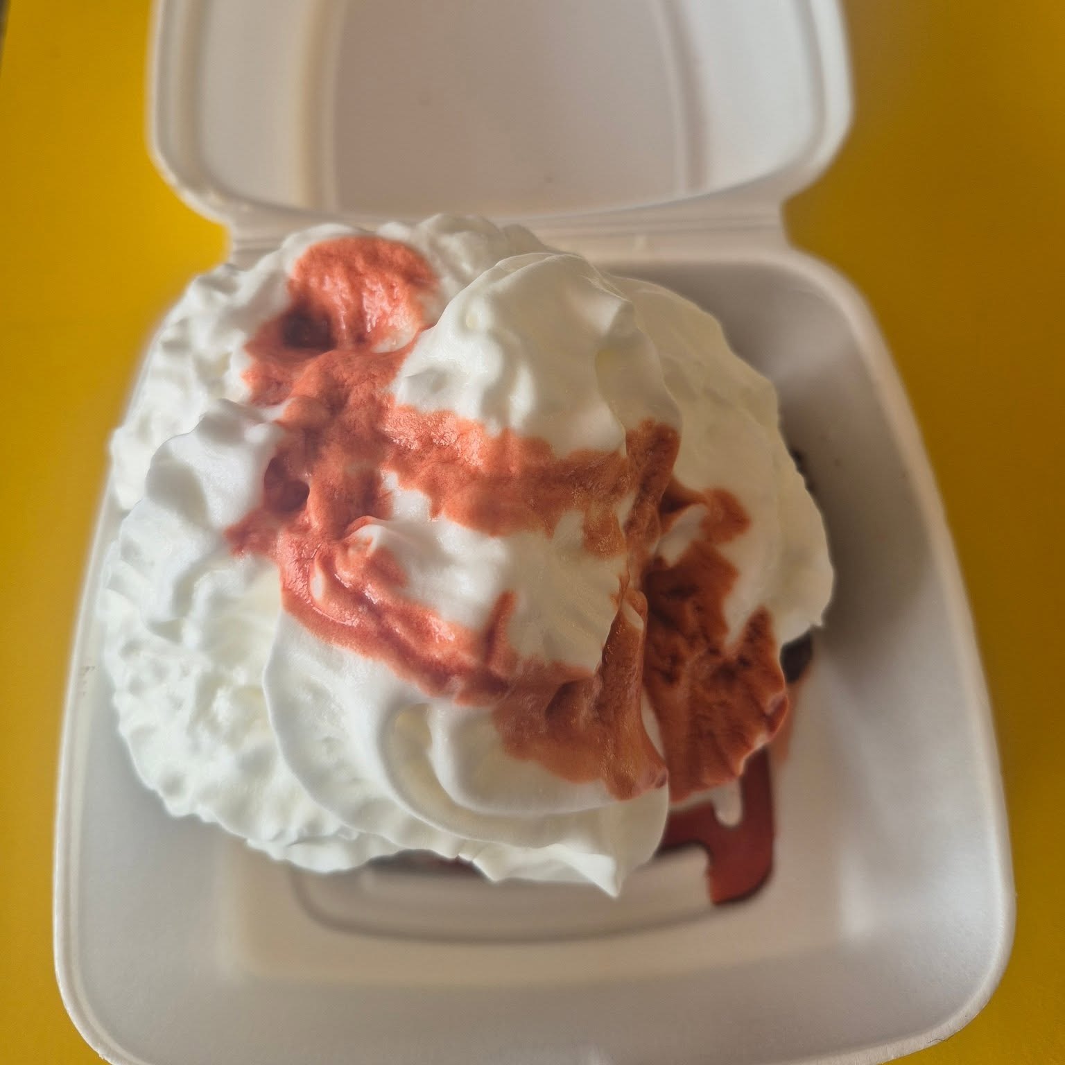 Cheerwine sundae topped with whipped cream at The Candy Shoppe on Main