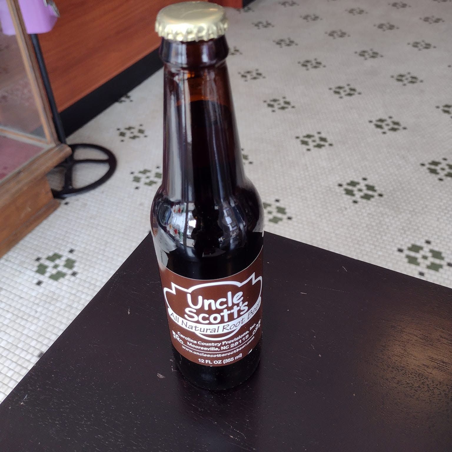 Uncle Scott's Root Beer bottle on the table at The Candy Shoppe on Main