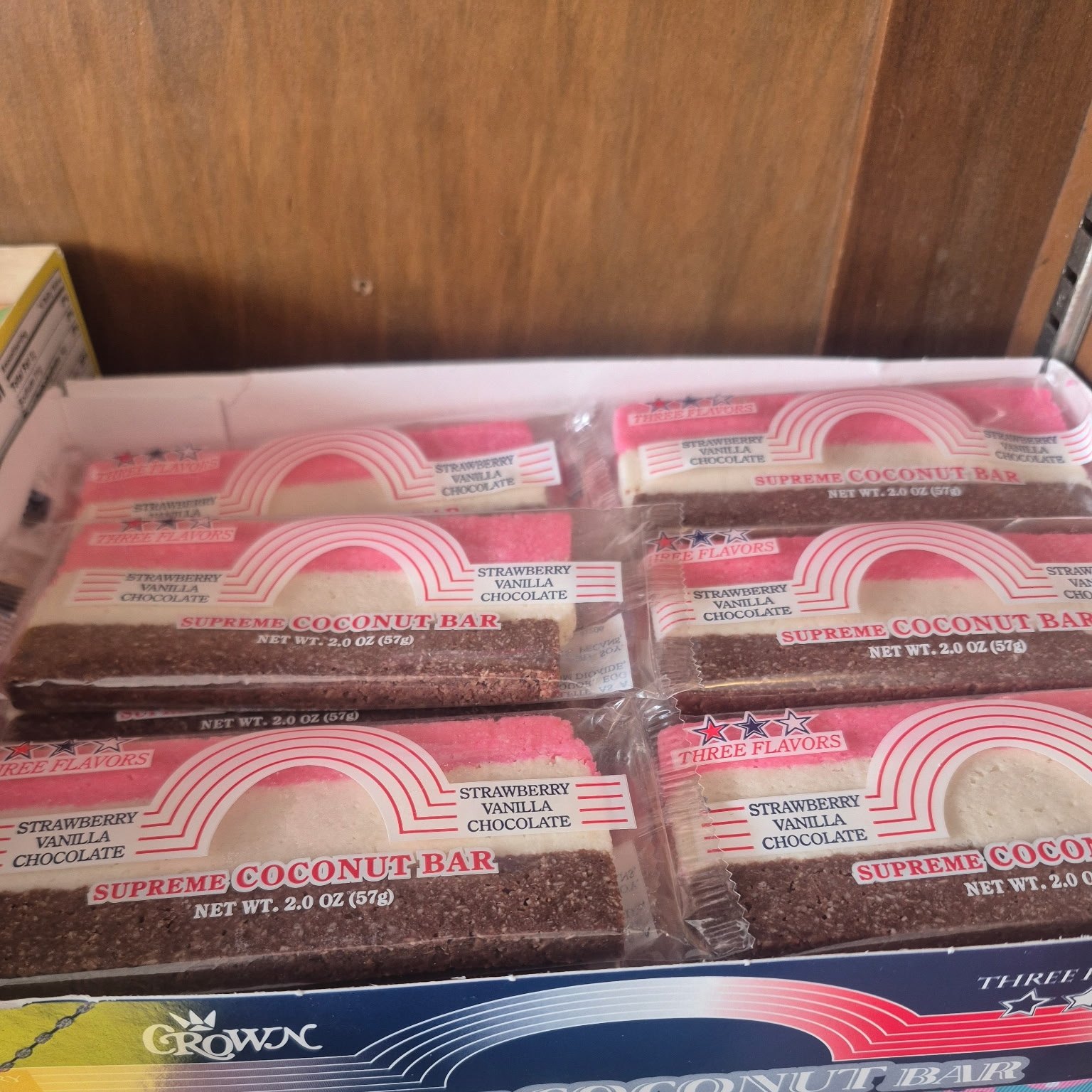 Crown Supreme coconut bars in strawberry, vanilla, and chocolate at The Candy Shoppe on Main