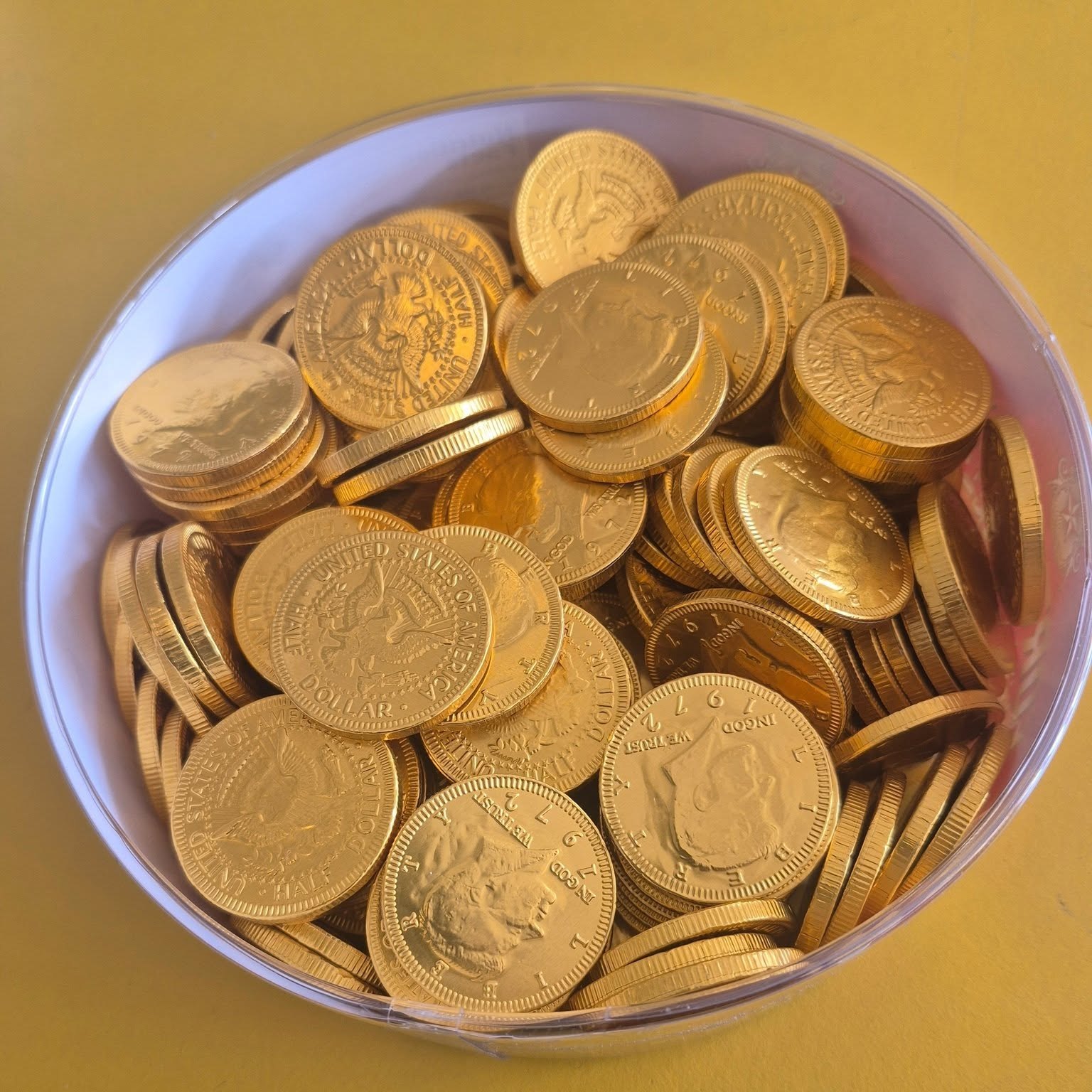 Bowl of foil-wrapped chocolate gold coins at The Candy Shoppe on Main