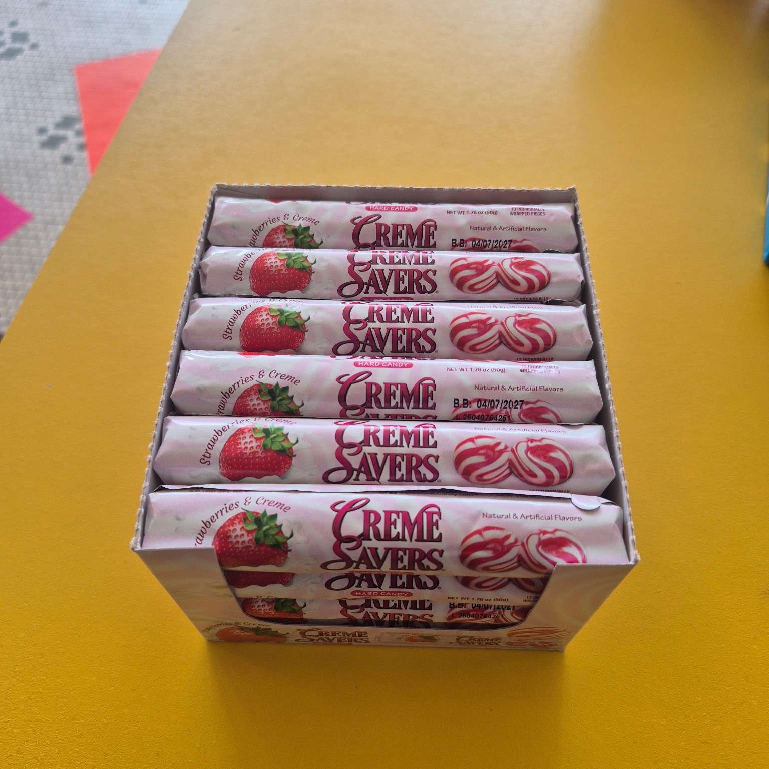 Rolls of Strawberries and Creme Savers hard candy at The Candy Shoppe on Main