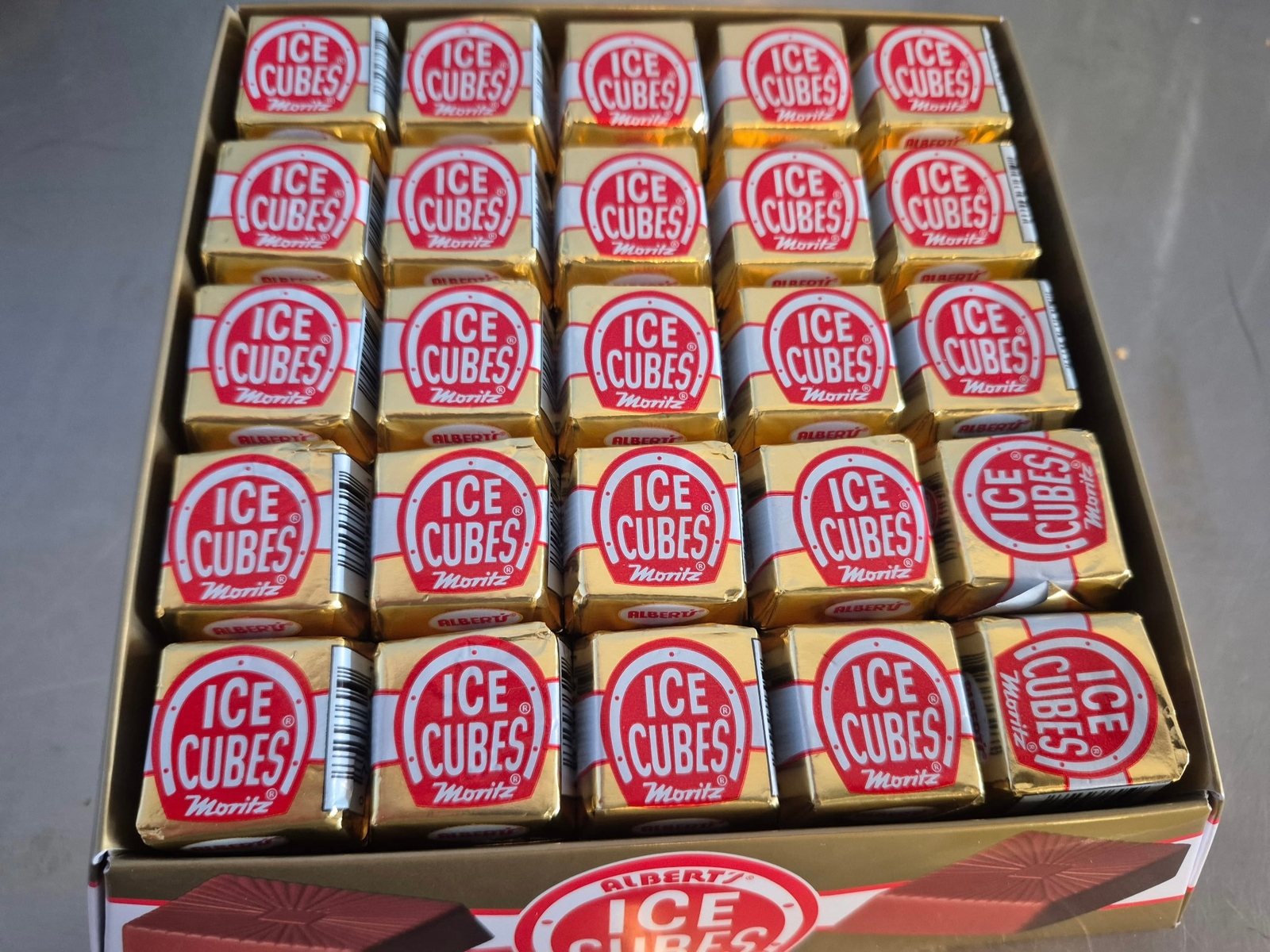 Box of Albert's Ice Cubes chocolates in gold foil at The Candy Shoppe on Main