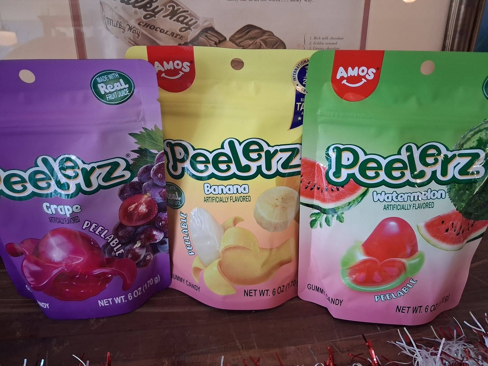 Bags of AMOS Peelerz peelable gummy candy at The Candy Shoppe on Main