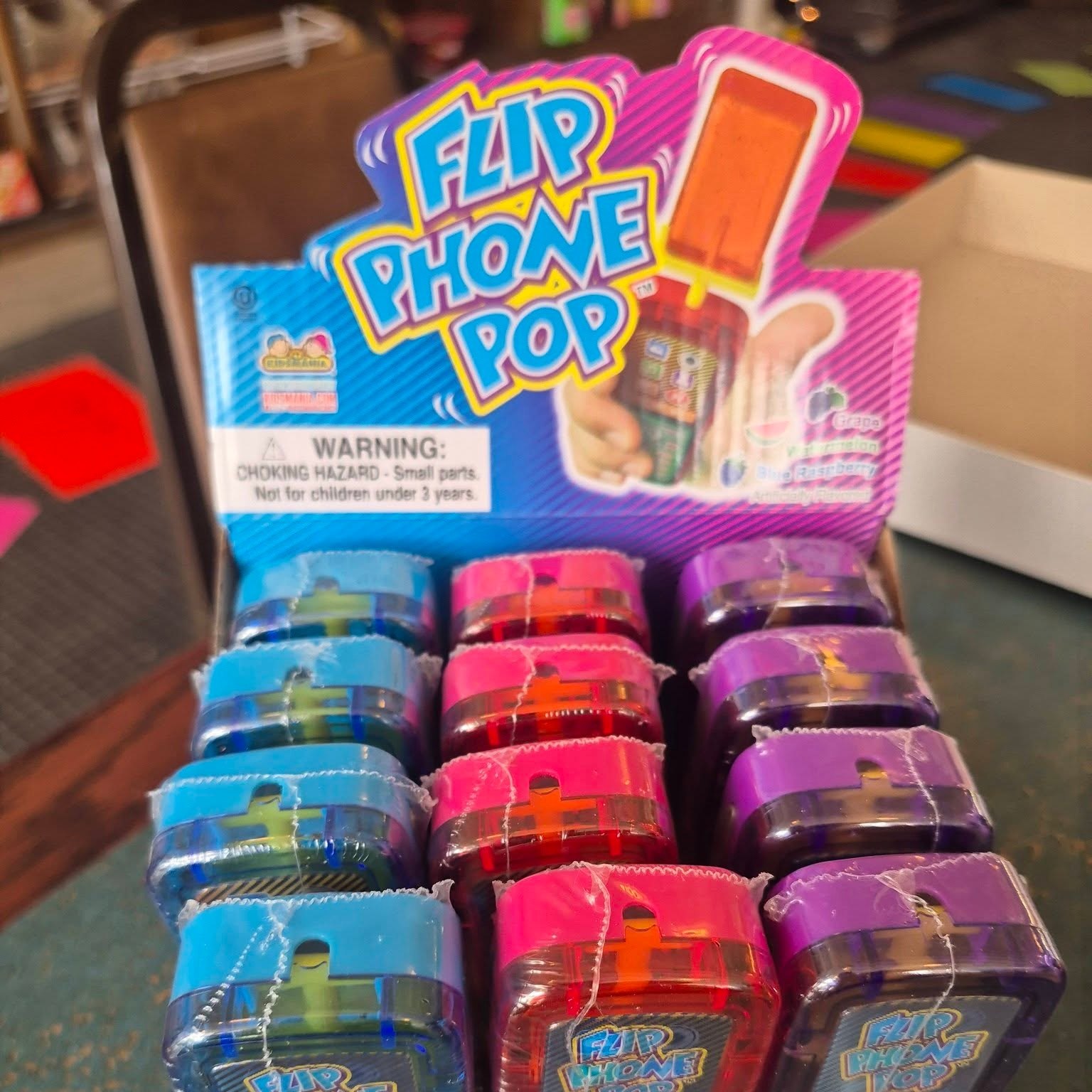 Box of Flip Phone Pop novelty lollipops at The Candy Shoppe on Main