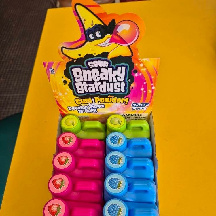 Display of Sneaky Stardust sour gum powder at The Candy Shoppe on Main