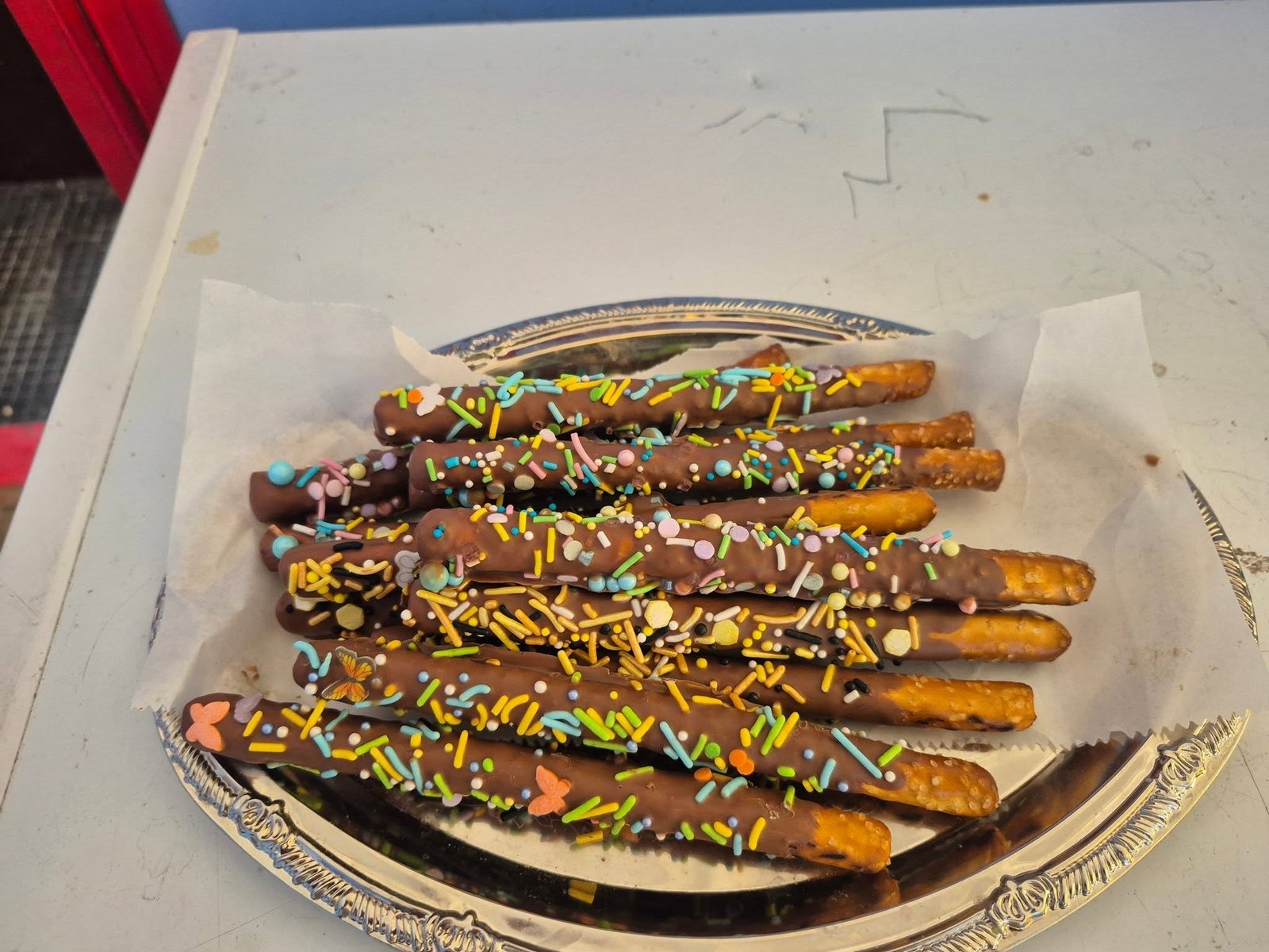 Chocolate-dipped pretzel rods with sprinkles at The Candy Shoppe on Main