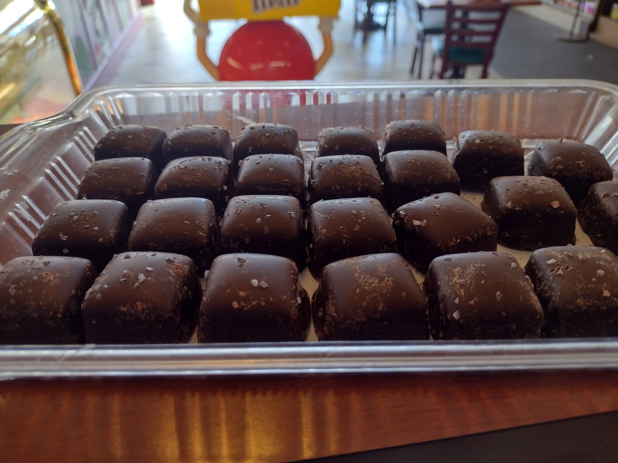 Tray of sea salt chocolate caramels at The Candy Shoppe on Main