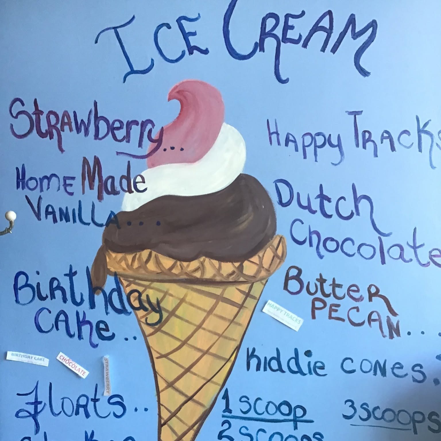 The hand-painted ice cream flavor board at The Candy Shoppe on Main